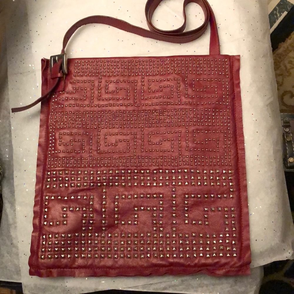 INGE RED STUDDED CROSSBODY HANDBAG.